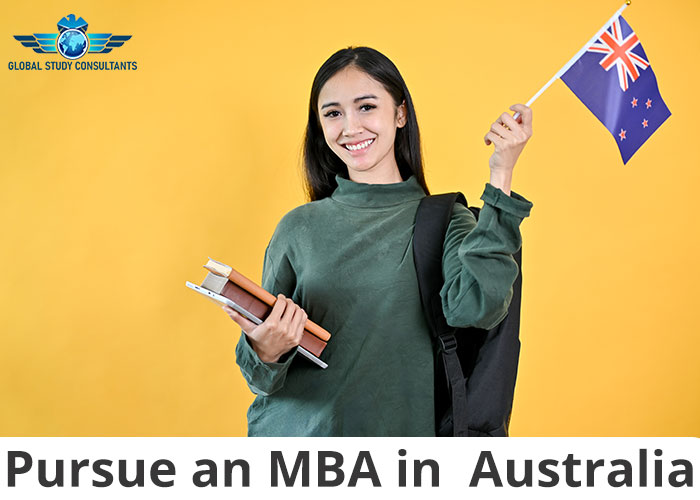 female college student is holding her books and the Australia flag